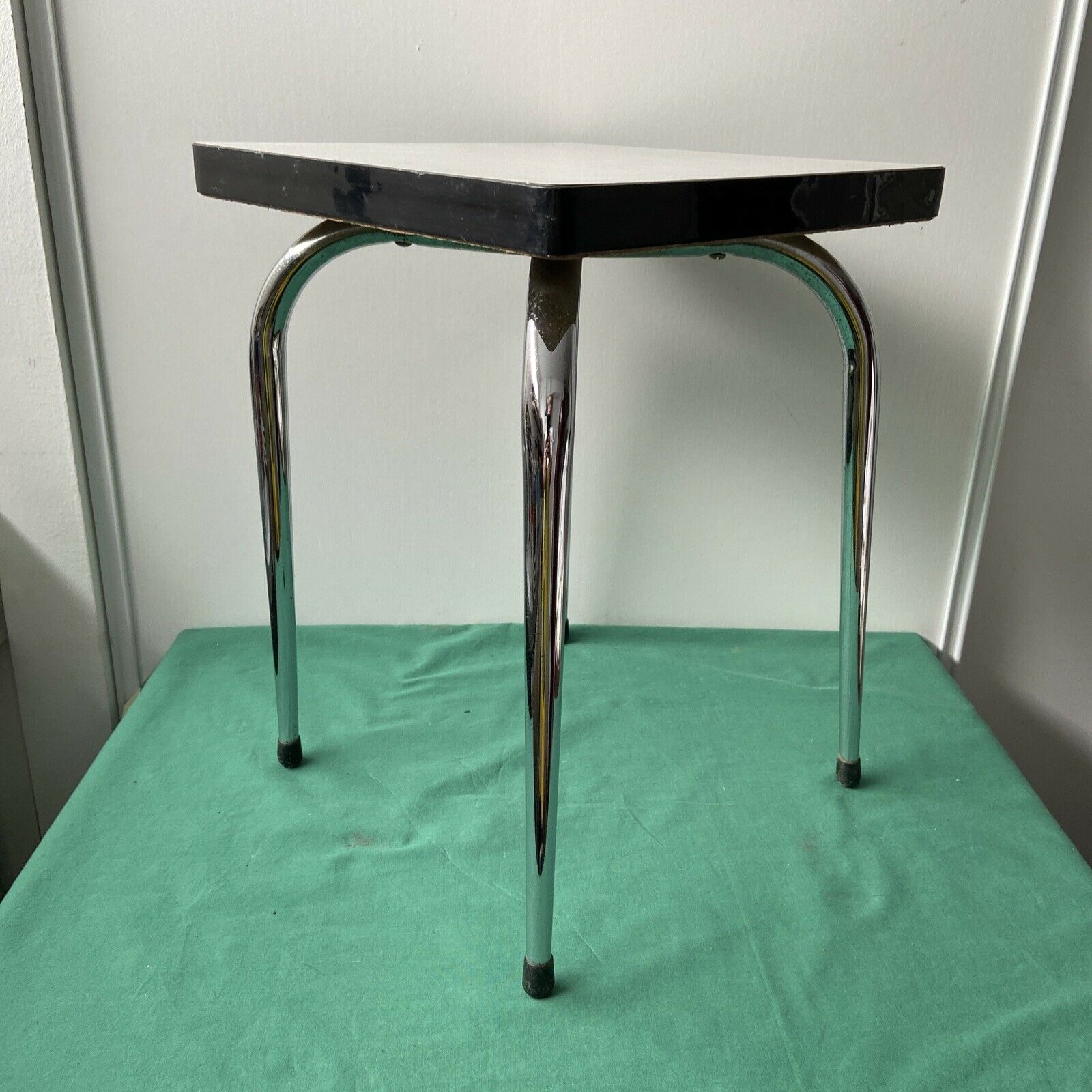 White stool in formica and metal