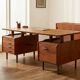 Vintage 1950s teak desk by designer Jacques Hauville.