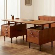 Vintage 1950s teak desk by designer Jacques Hauville.