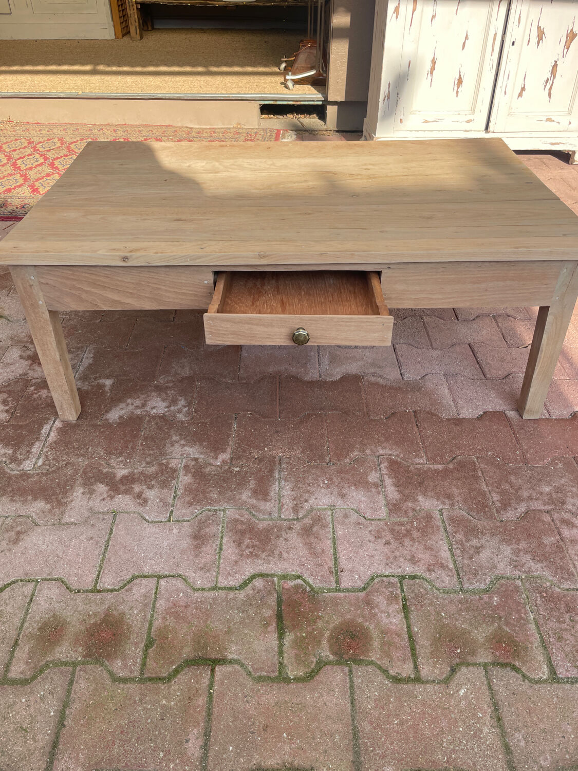 Wooden coffee table with drawer