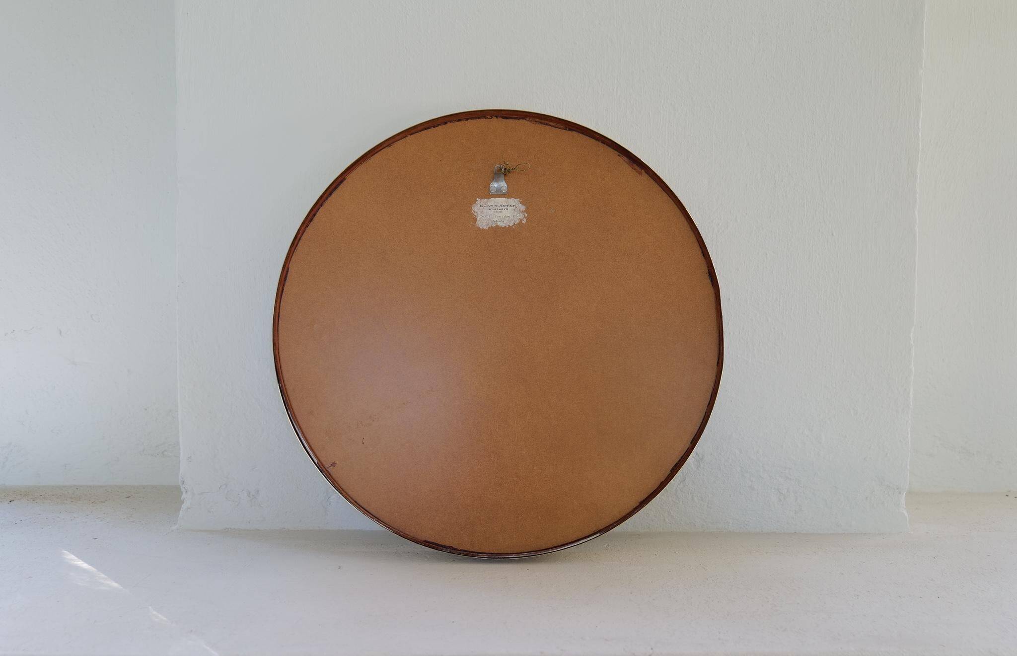 Modern round brass mirror from the mid-century by Glasmäster in Markaryd, Sweden, 1960s.