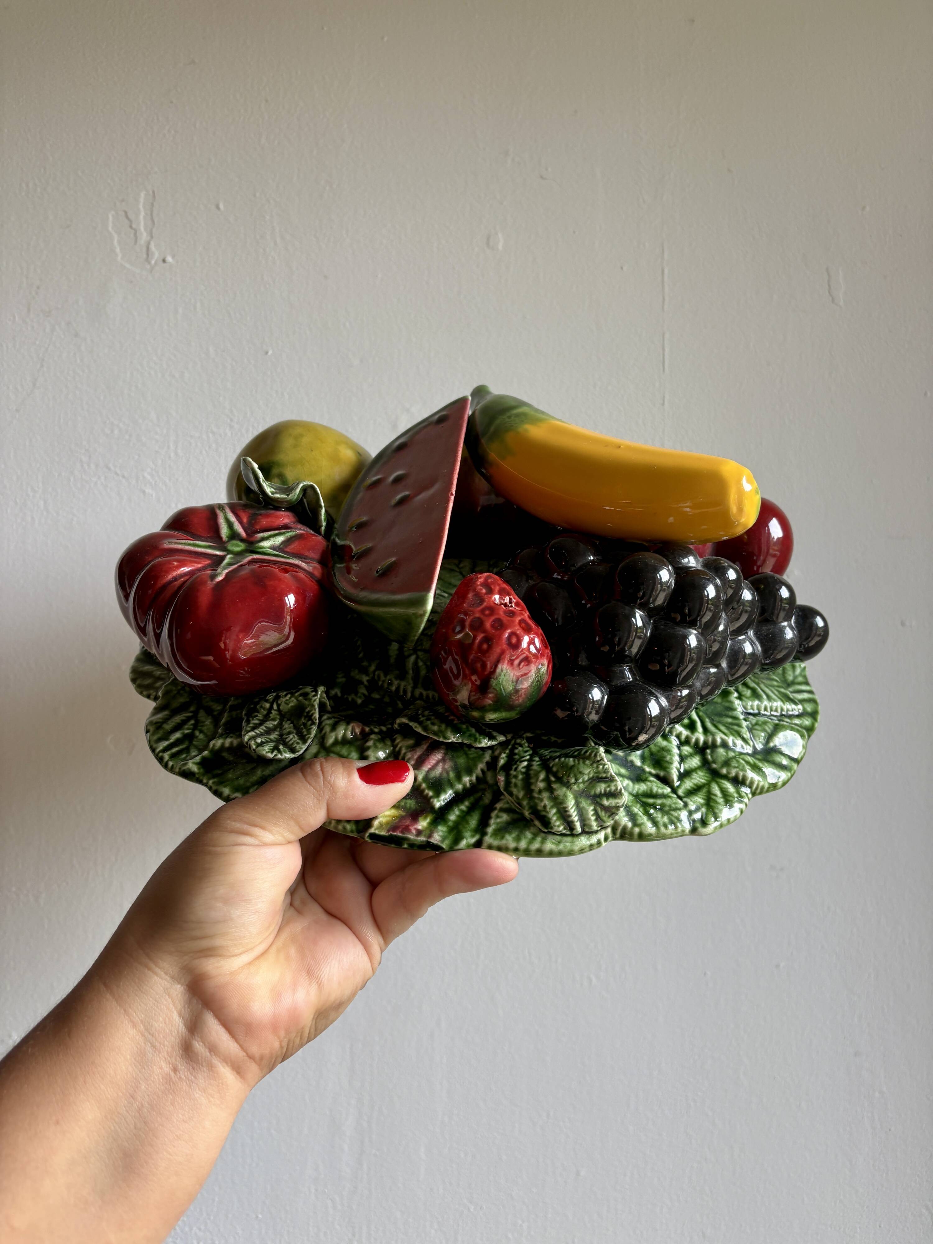 Vintage barbotine dish with fruit decorations
