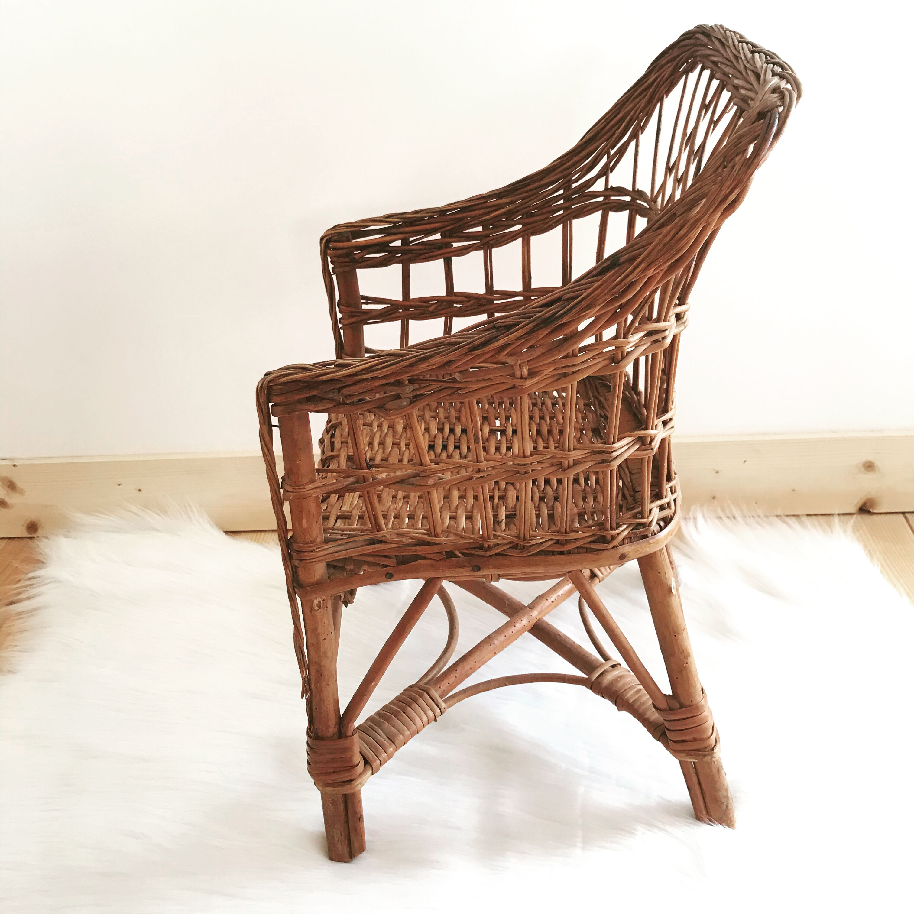 Vintage wicker children's armchair