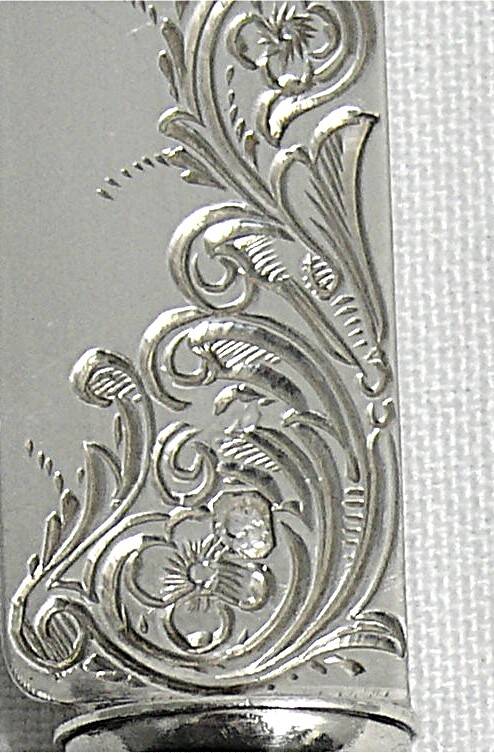 12 fruit knives, dessert knives, serving knives, engraved silver blades.