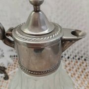 Antique pewter and glass carafe