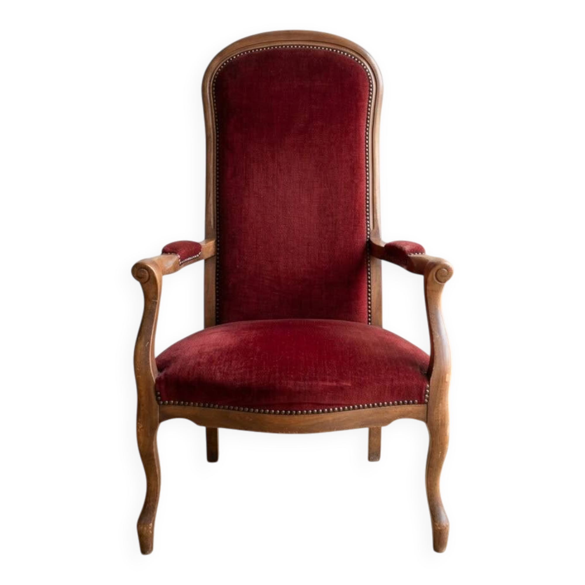 Louis XV style Voltaire armchair in wood and burgundy fabric.