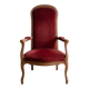 Louis XV style Voltaire armchair in wood and burgundy fabric.