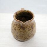Vintage pitcher in pyrite sandstone