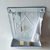 Old enamelled kitchen utensil display