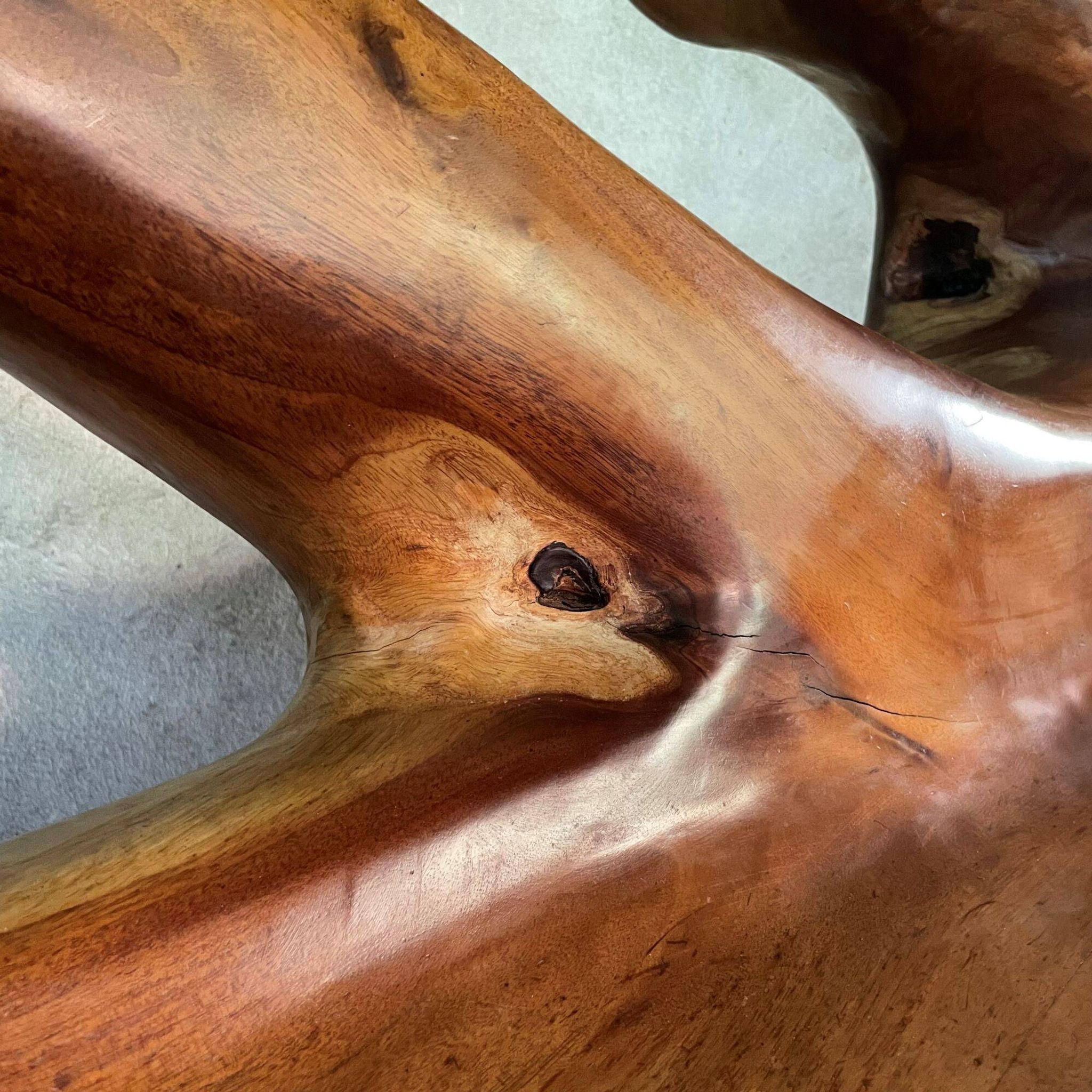 Sculptural bench in solid wood
