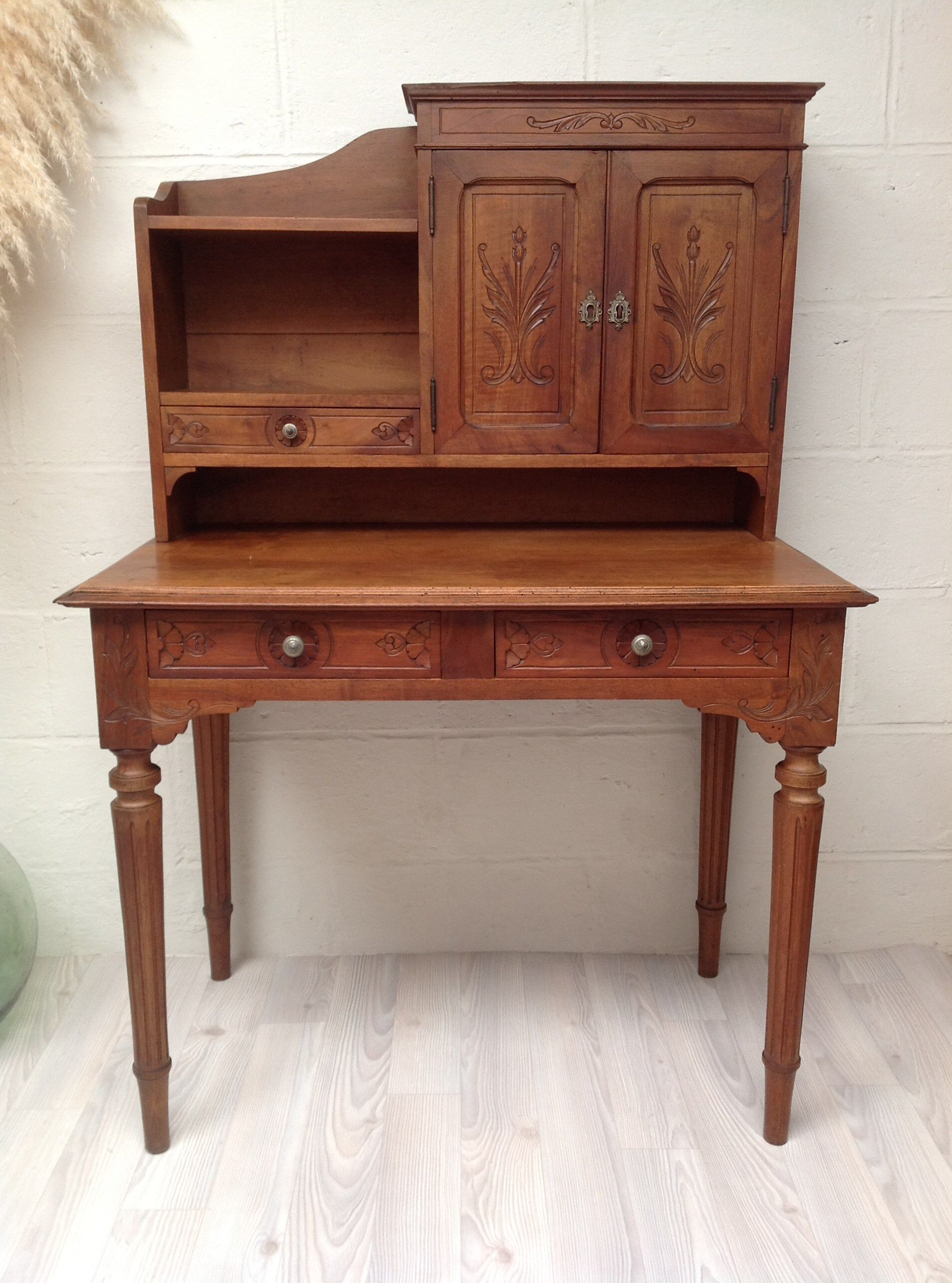 Secretary carved wood