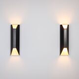 Architectural pair of vintage black metal wall lamps with angular geometric