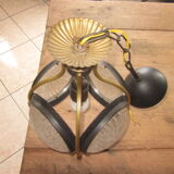 Suspension of years 50-60 in glass and metal