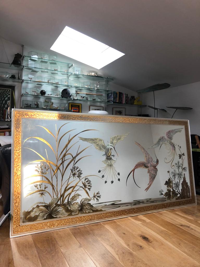 Mirror decorated with birds