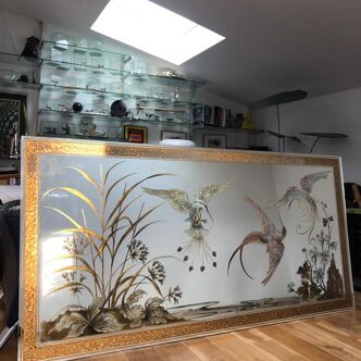 Mirror decorated with birds