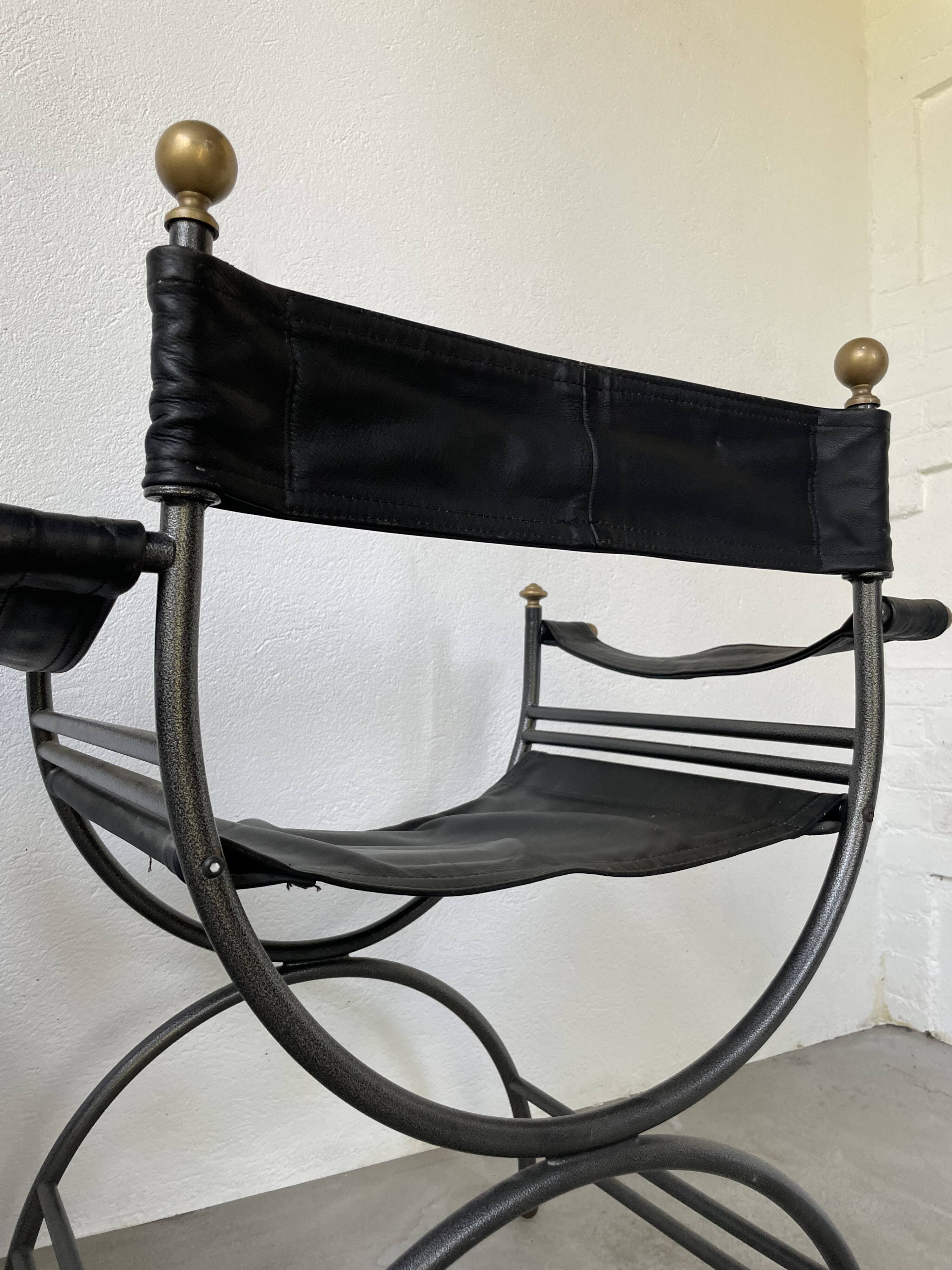 Pair of leather “curule” emperor armchairs