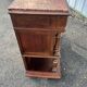 Henri II style console table with a red marble top.