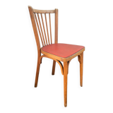 Baumann chair stamped in red skai