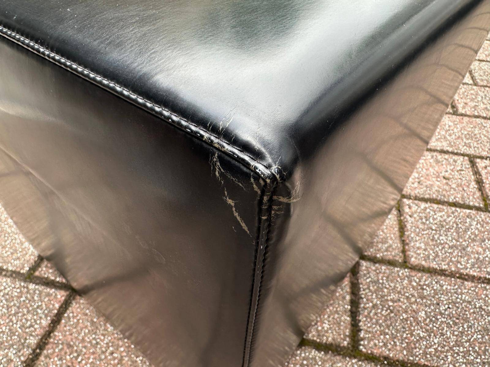 Pair of designer poufs in faux leather
