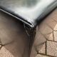 Pair of designer poufs in faux leather
