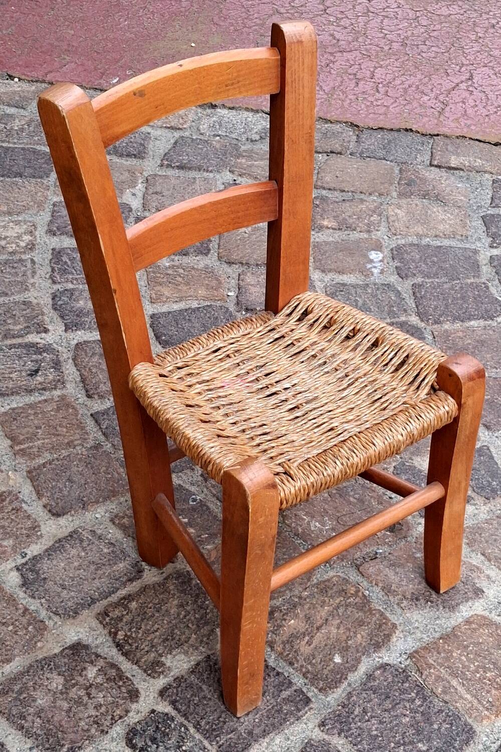 Small chair for children, folk art, wood and straw.