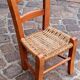 Small chair for children, folk art, wood and straw.