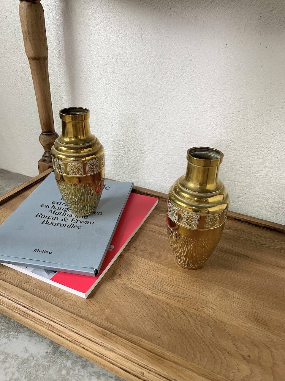 Duo of embossed brass vases