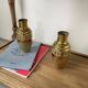 Duo of embossed brass vases