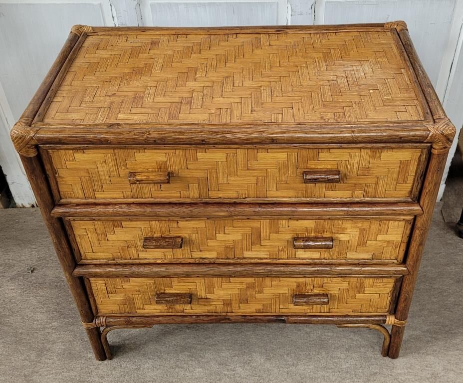 Chest of drawers made of wood, rattan and bamboo.