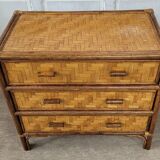 Chest of drawers made of wood, rattan and bamboo.
