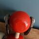 Lacquered wooden pull-along dog toy