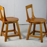 Pair of brutalist wooden back stools. France, circa 1960