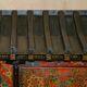 Vintage Chinese wardrobe painted with pagoda and drawers.
