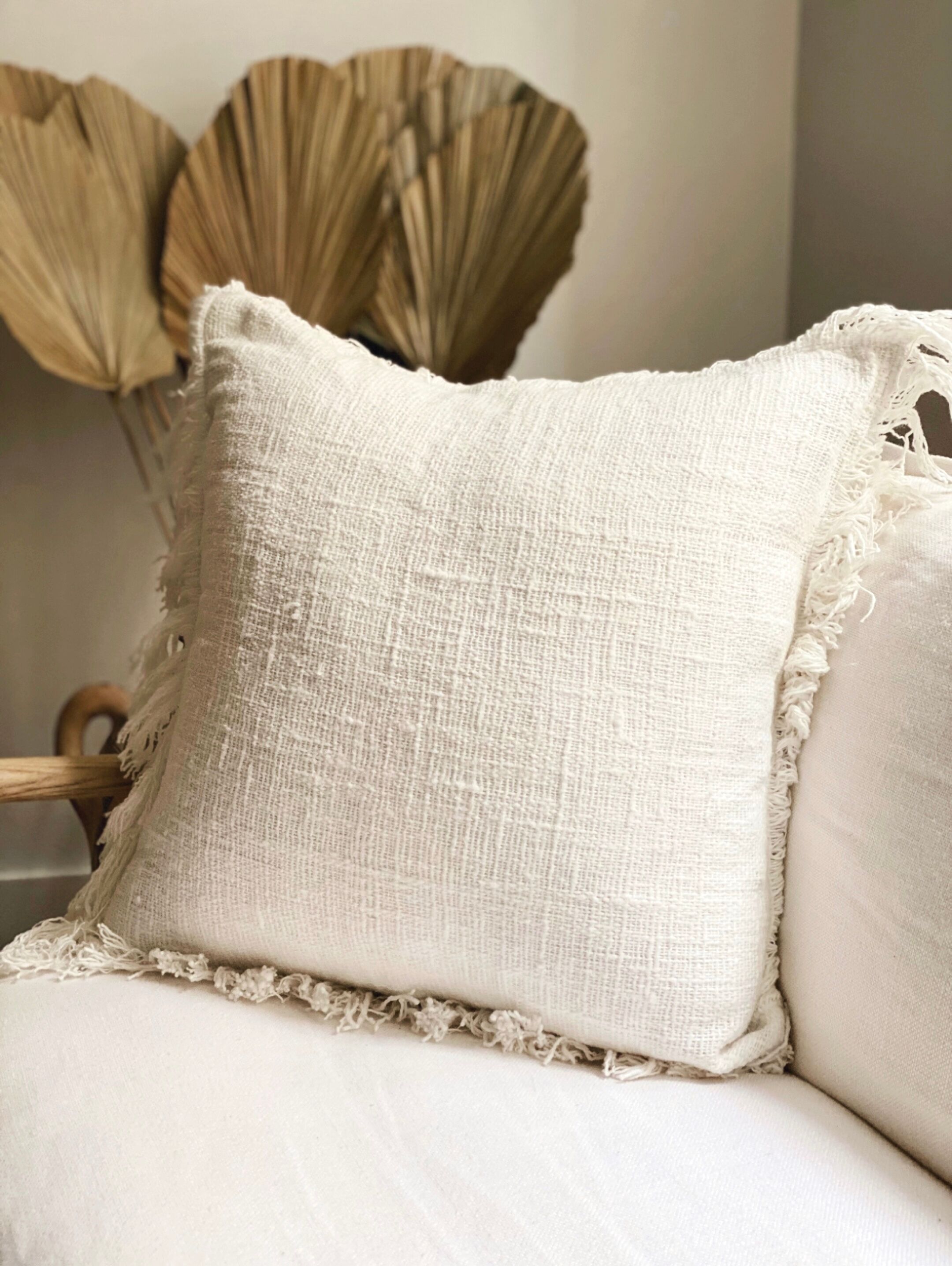 White linen bohemian cushion fringed