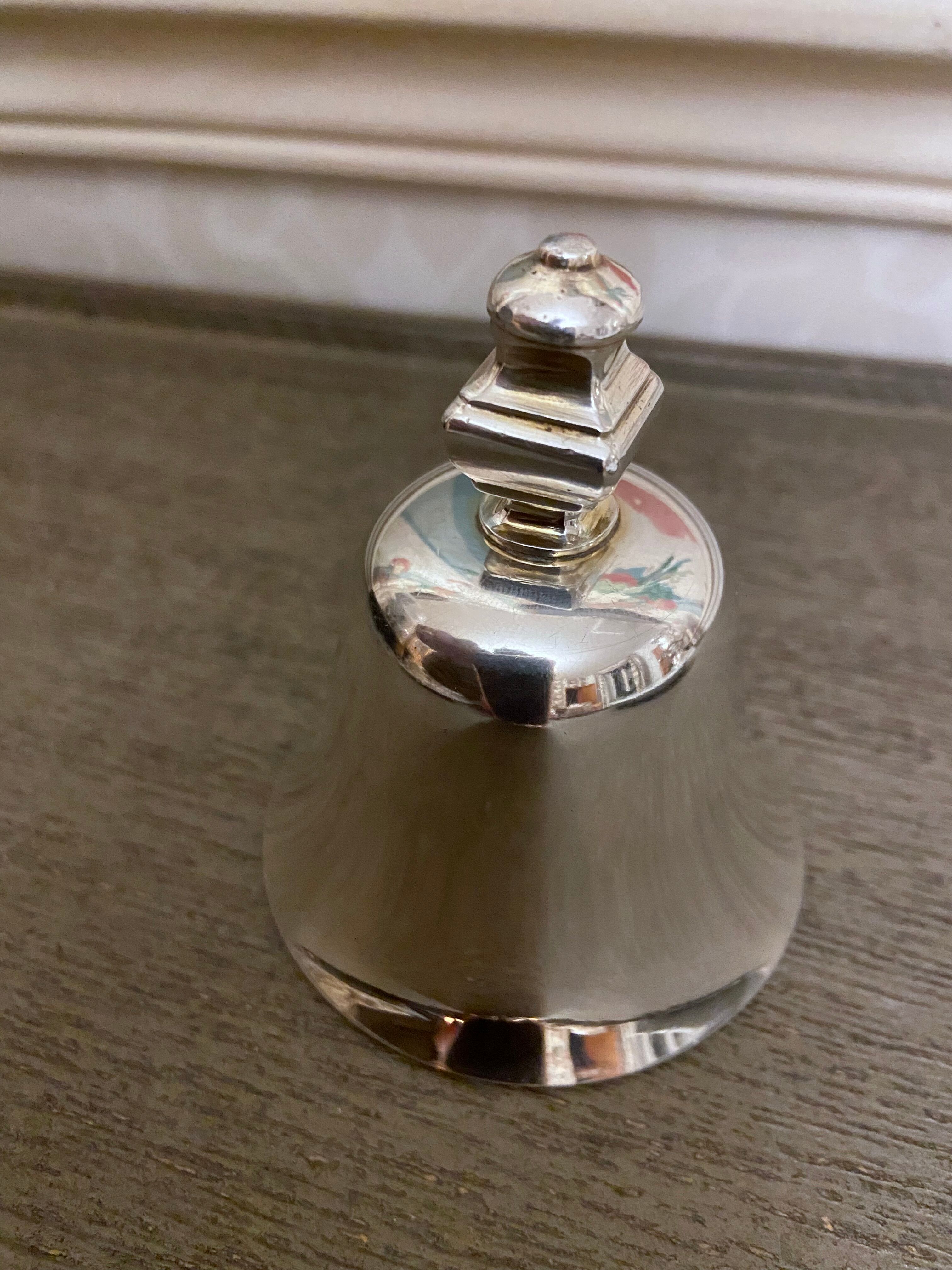 Small bell silver metal