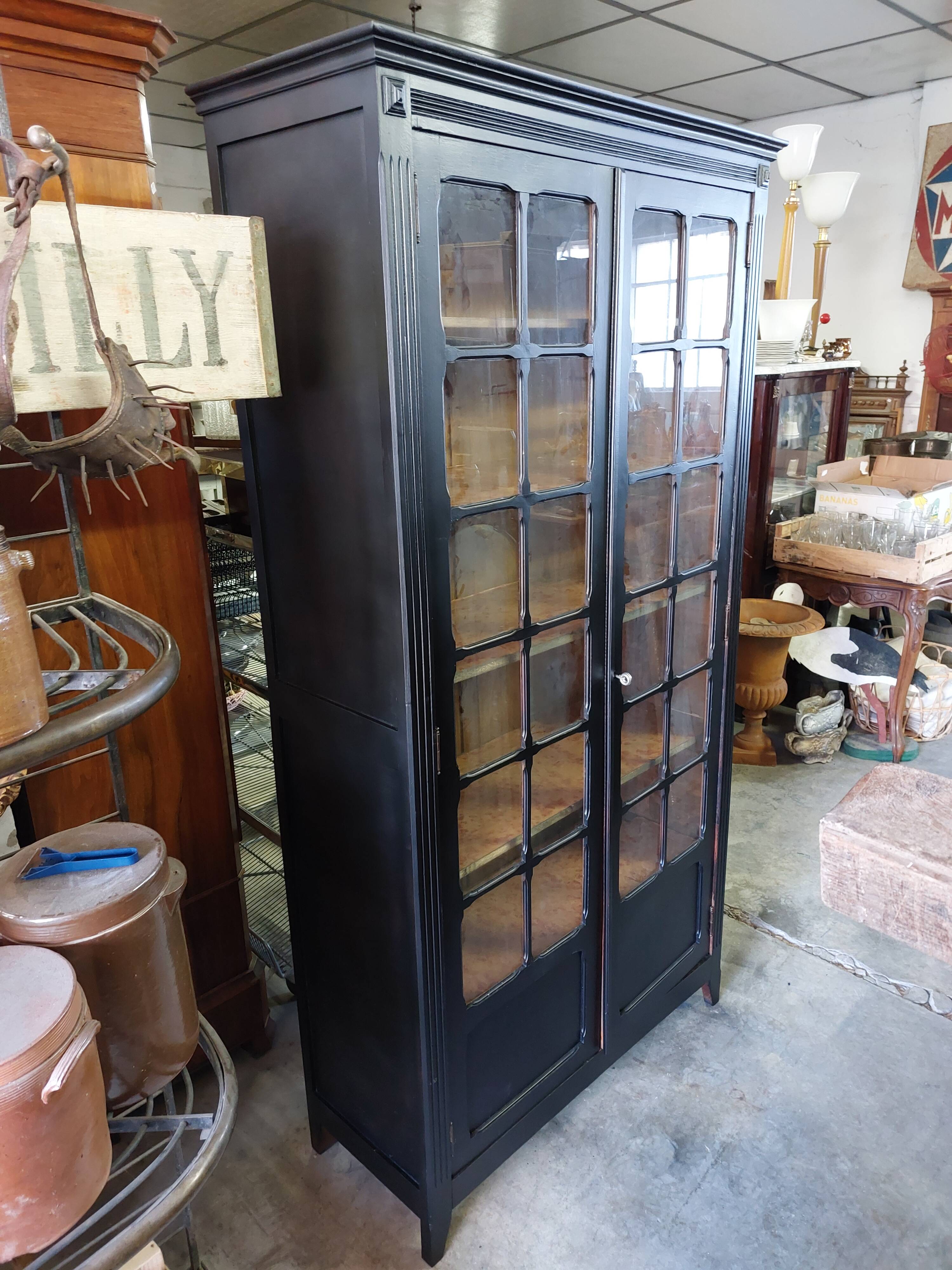 Parisian antique black patinated showcase