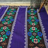 Romanian rug handwoven in wool, purple background with red and yellow stripes