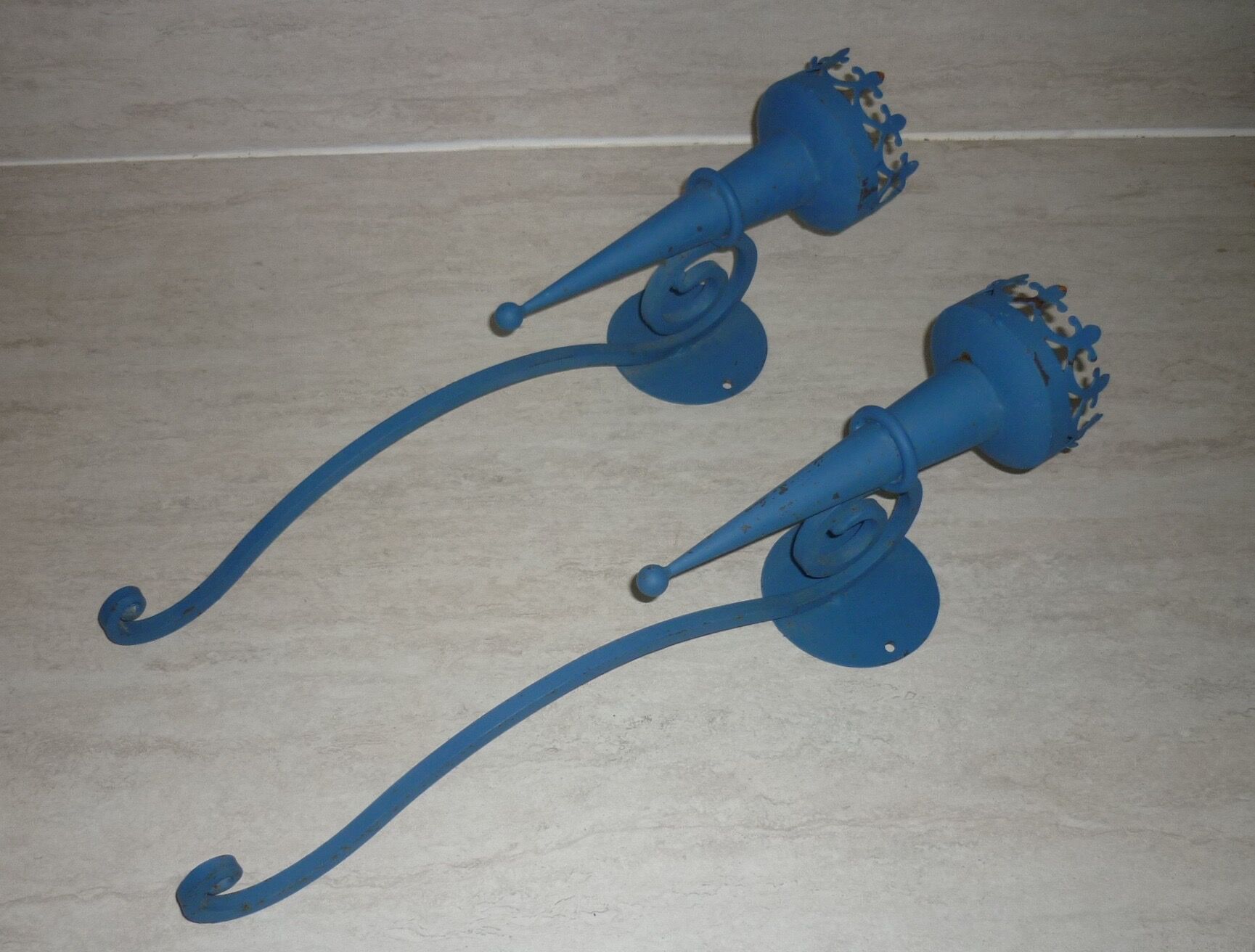 Pair of candle holders, blue torches