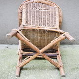 Desk with rattan and wicker armchair for children