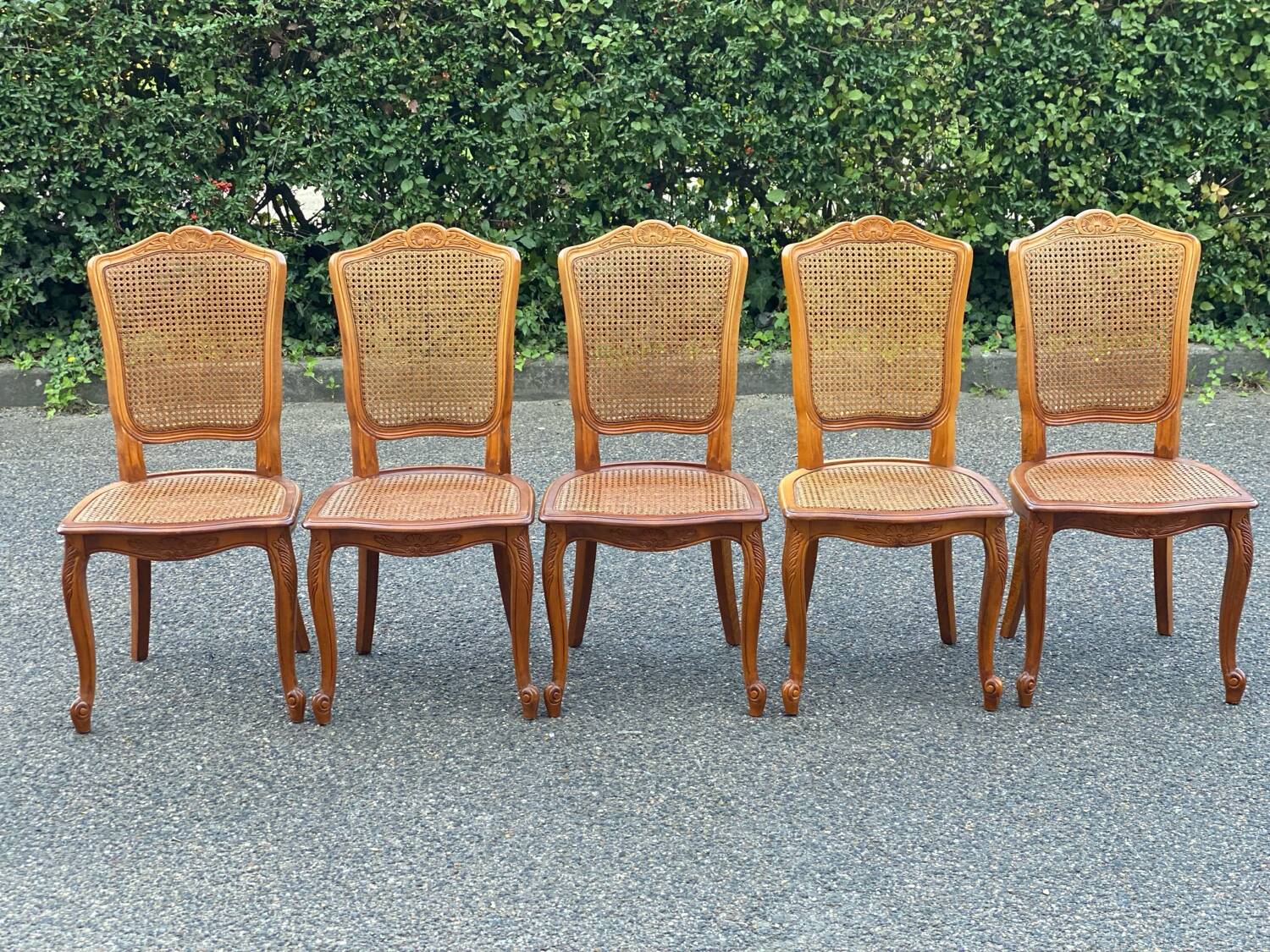 5 solid wood caned chairs, Louis XV style, stamped Baumann
