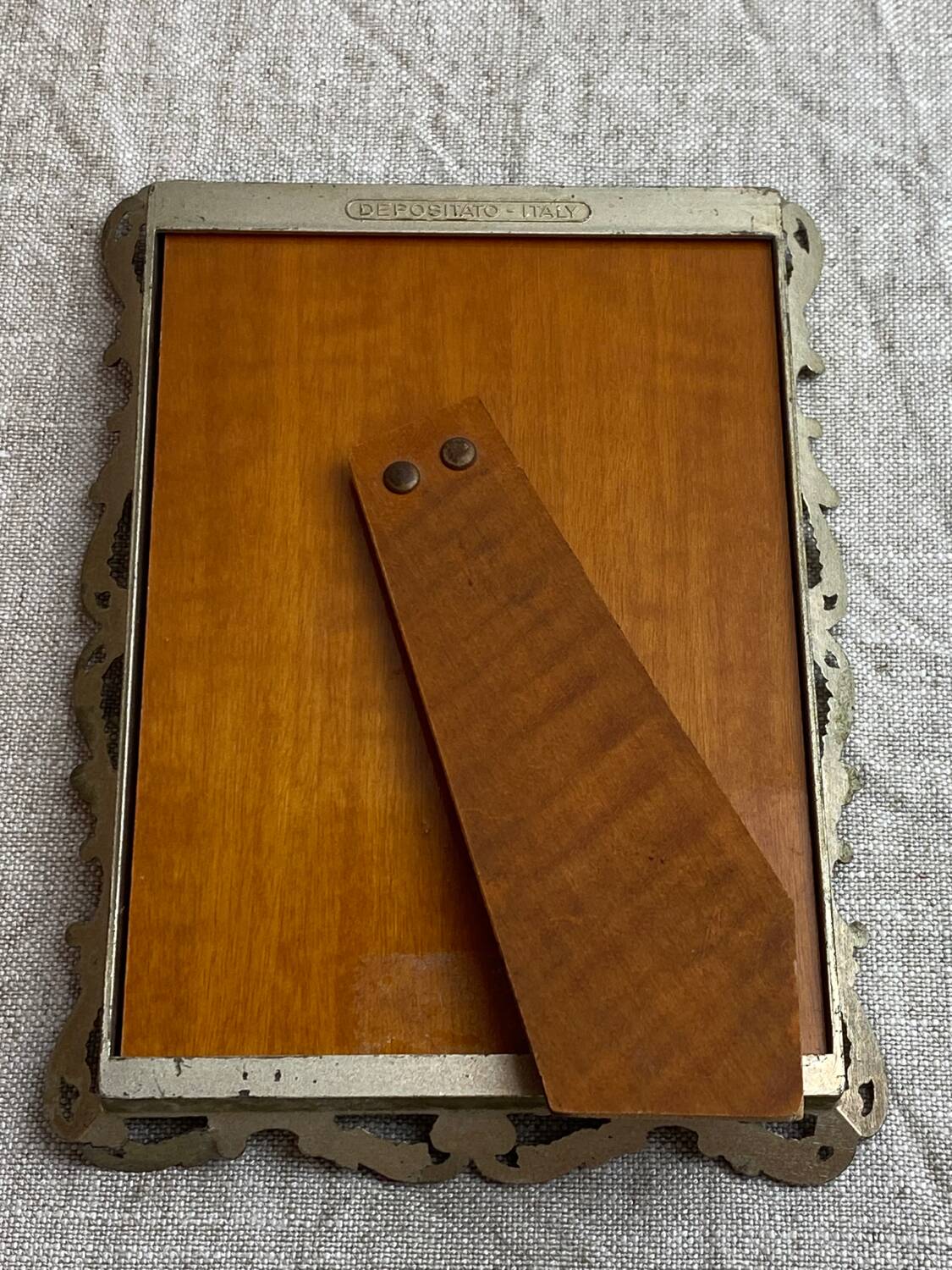 Italian gold metal frame on stand