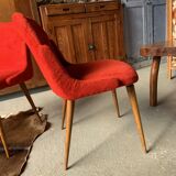 2 red moumoute chairs