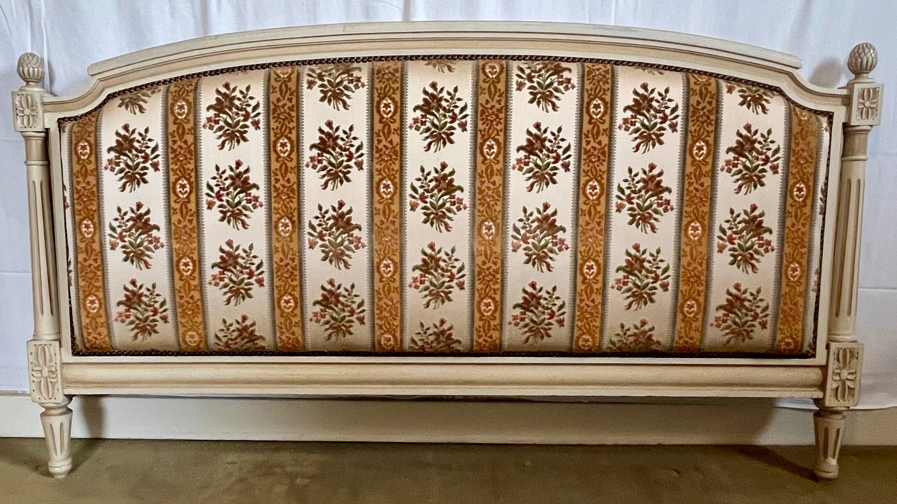 Louis XVI style bed in patinated wood with fluted columns.
