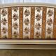 Louis XVI style bed in patinated wood with fluted columns.