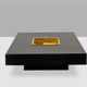 Willy Rizzo. Low table in black lacquered wood and gold brass. 1970s.