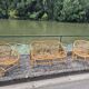 Rattan lounge with two armchairs and a vintage 1950s bench.