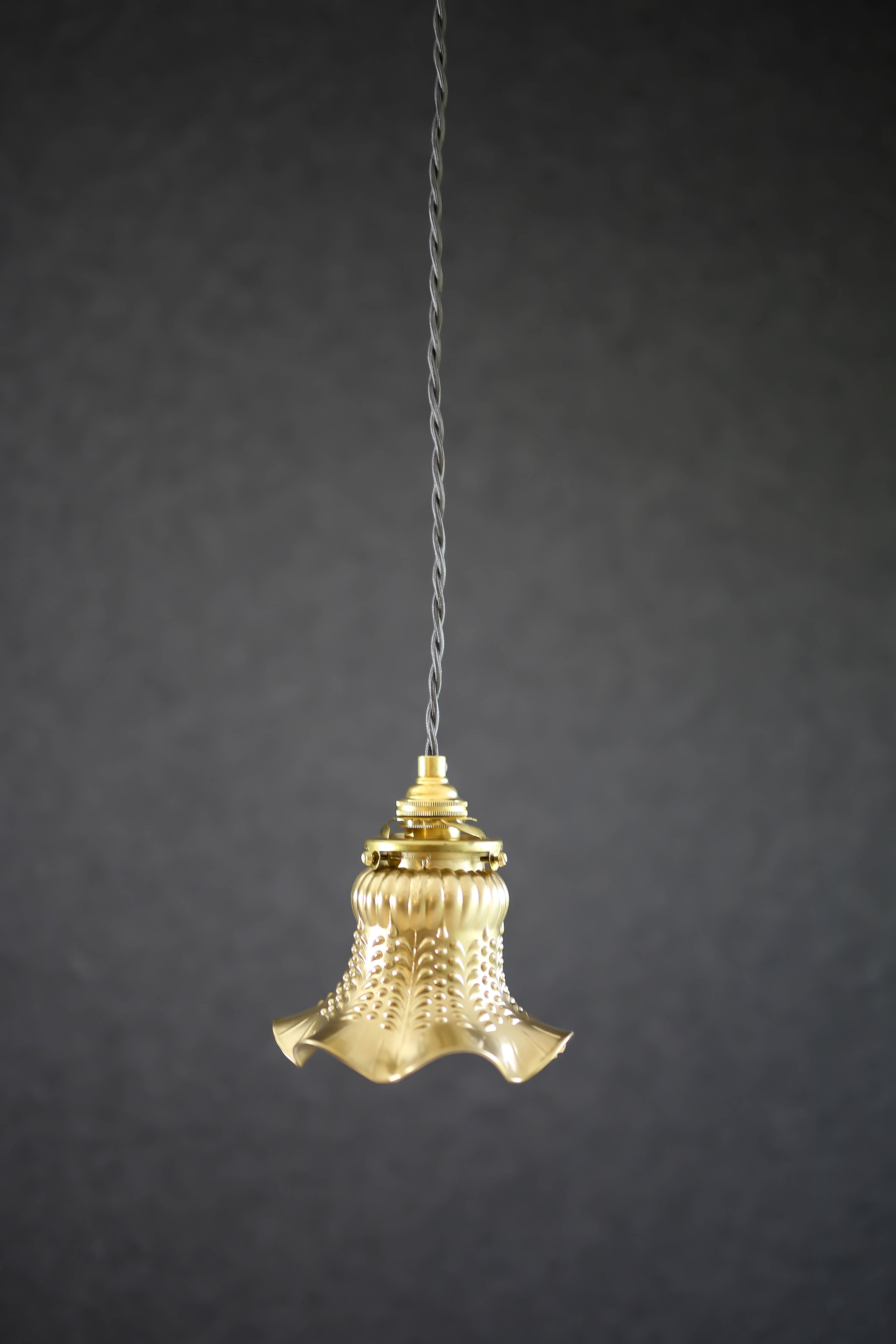 Old tulip suspension painted gold with new brass