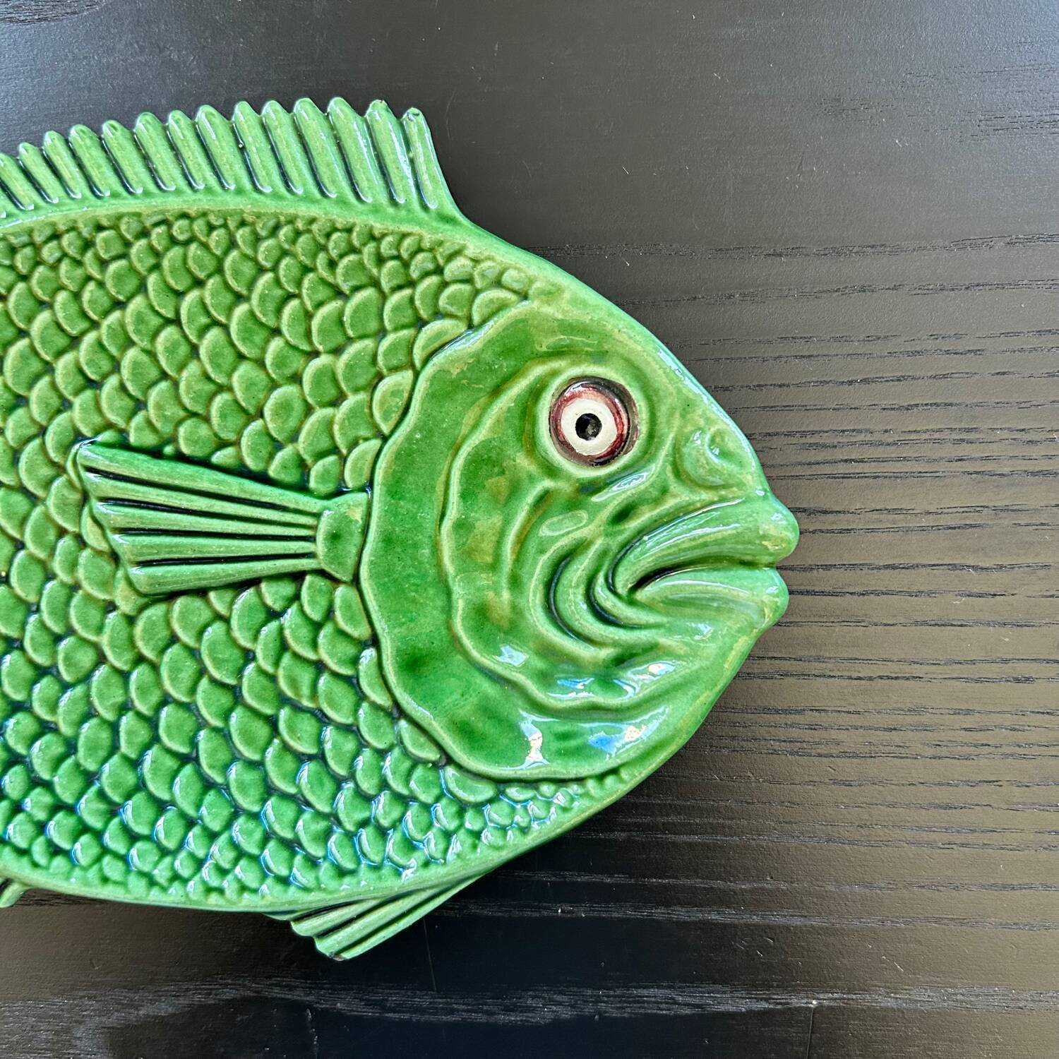 Fish dish in green earthenware