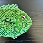 Fish dish in green earthenware