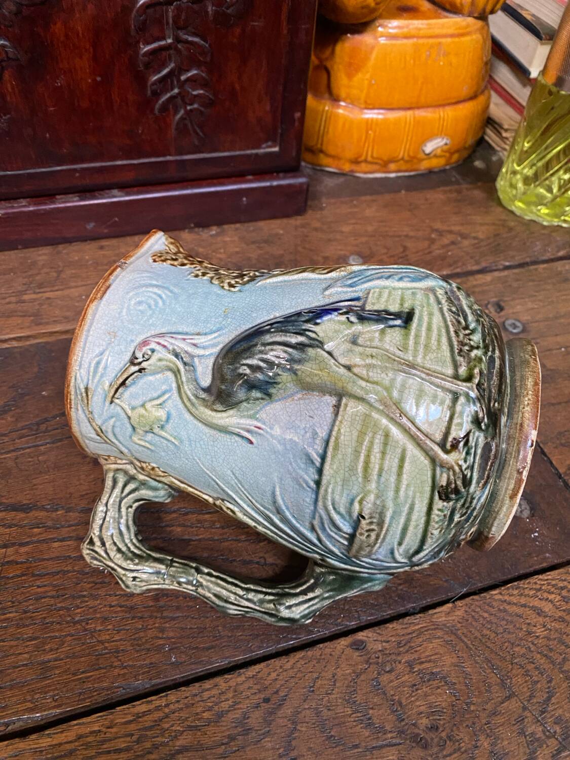 Majolica pitcher depicting a heron, 1900
